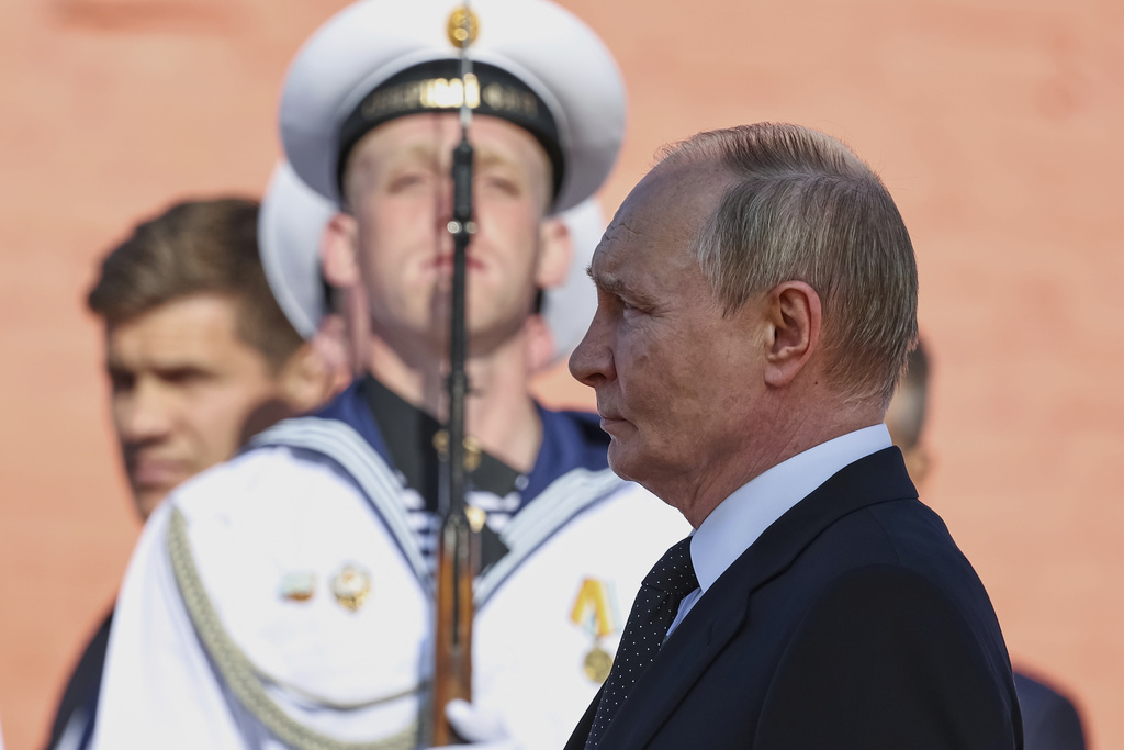 Russian President Putin arrives to attend a flag raising ceremony of the Knyaz Pozharsky nuclear-powered Borei-A class submarine in Severodvinsk, Russia. Source: Alexander Kazakov, AP Russia Doesn’t Stop its Nuclear Blackmail: What Challenges Does this Pose for the World?