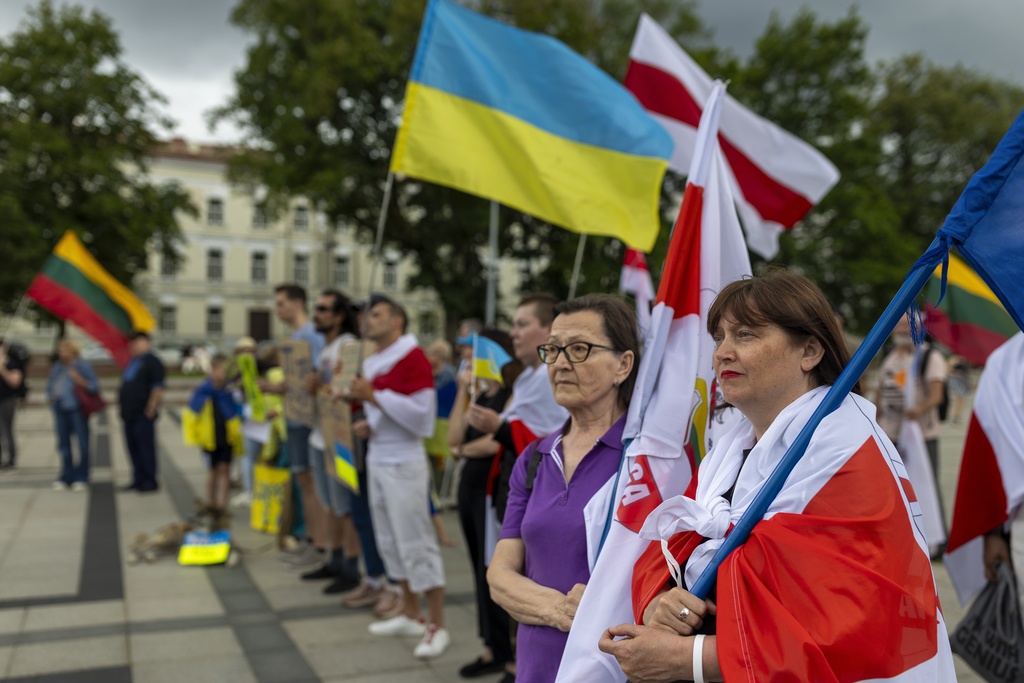 People attend a demonstration against Russia's war on Ukraine, in Vilnius, Lithuania, Monday, July 28, 2025. Source: AP Photo/Mindaugas Kulbis