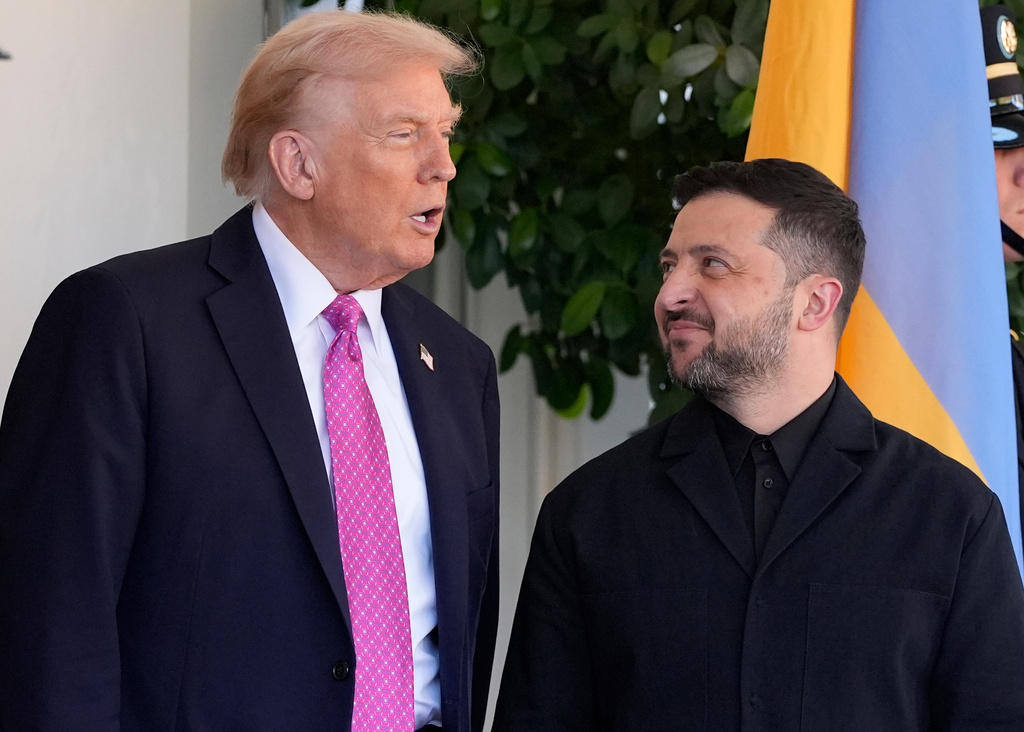 Donald Trump, left, greets Ukraine's President Volodymyr Zelenskyy at the White House. Source: AP