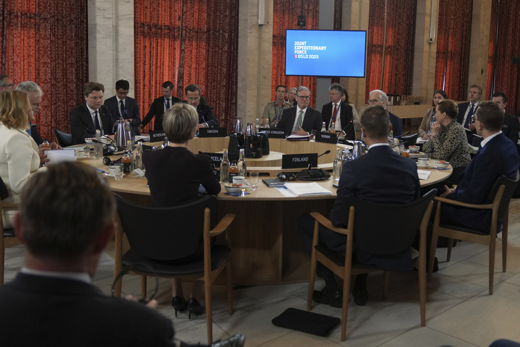 Britain's Prime Minister Keir Starmer, center, sits a round table during the Joint Expeditionary Force (JEF) Leaders' Summit in Oslo. Source: AP.