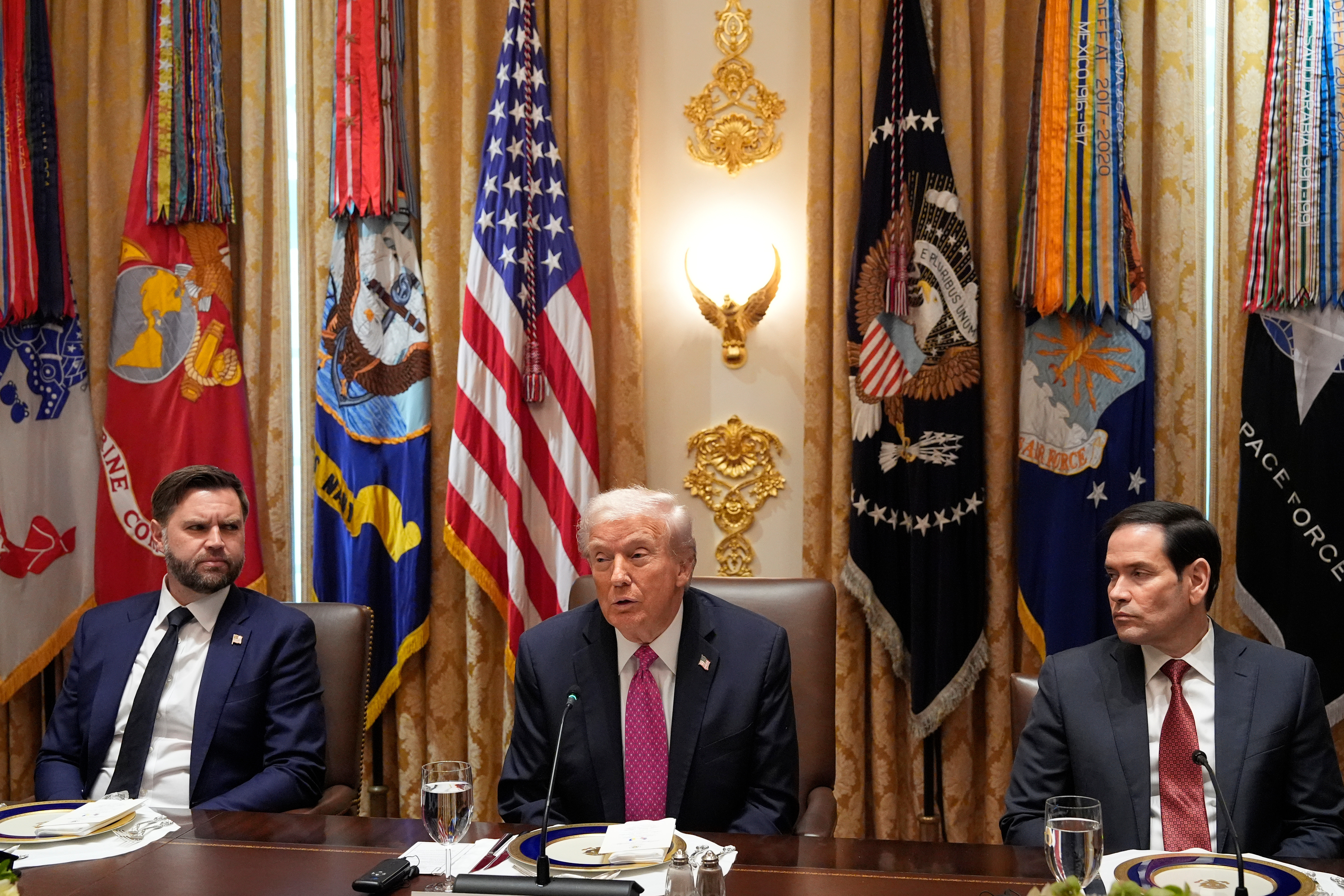 President Donald Trump, center, speaks before a lunch with Ukraine's President Volodymyr Zelenskyy, not pictured, as Vice President JD Vance, left, and Secretary of State Marco Rubio listen, in the Cabinet Room of the White House, Friday, Oct. 17, 2025, in Washington. Source: AP/Alex Brandon
