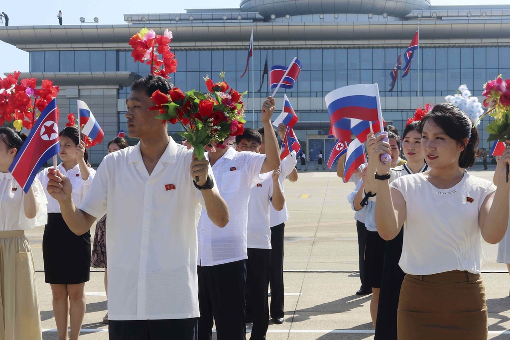 People welcome on the arrival of Russian delegation headed by Alexander Kozlov, minister of Natural Resources and Ecology at the Pyongyang International Airport in Pyongyang, North Korea, on Monday, July 28, 2025. Source: AP Photo/Cha Song Ho