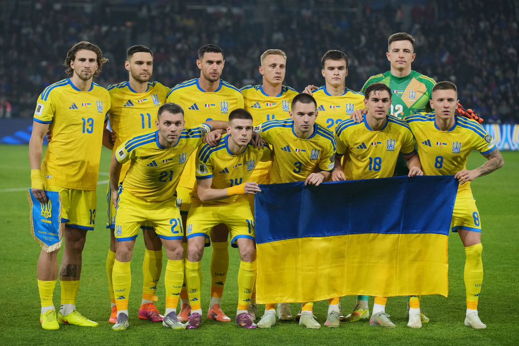 Players on the Ukraine national team pose for a photo ahead of a World Cup 2026 group D qualifying soccer match between France and Ukraine in Paris, Thursday, Nov. 13, 2025. Source: AP Photo/Christophe Ena