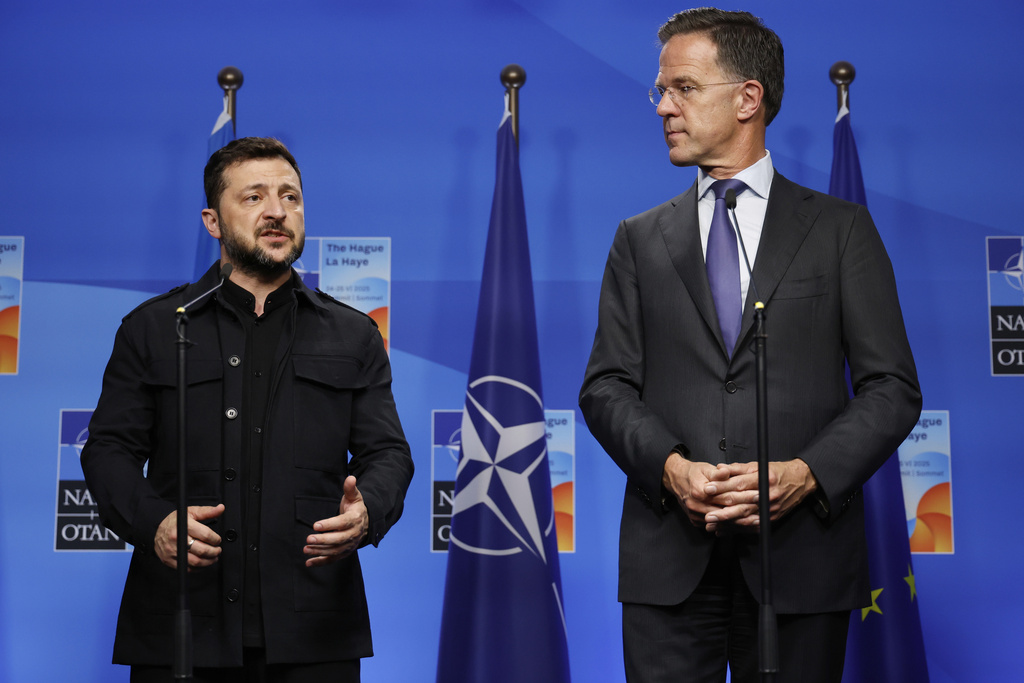 NATO Secretary General Mark Rutte, right, listens as Ukraine's President Volodymyr Zelenskyy speaks prior to a meeting on the sidelines of the NATO summit in The Hague, Netherlands, Tuesday, June 24, 2025.Source: AP Photo.