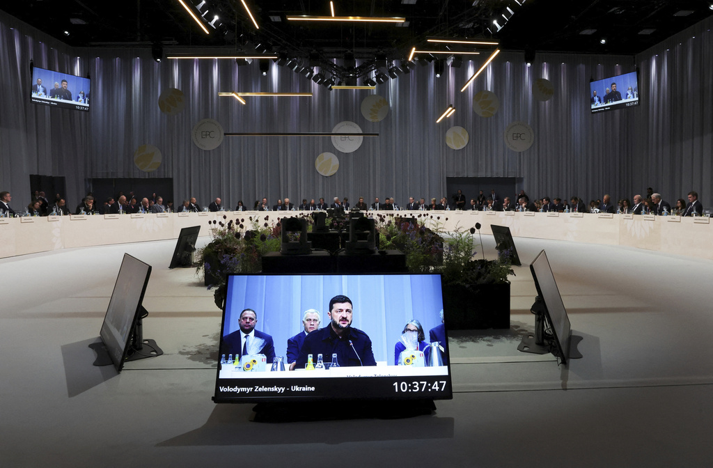 Ukrainian President Volodymyr Zelenskyy is seen on a giant screen as he speaks during the European Political Community summit, in Copenhagen, Thursday, Oct. 2, 2025. Source: AP.