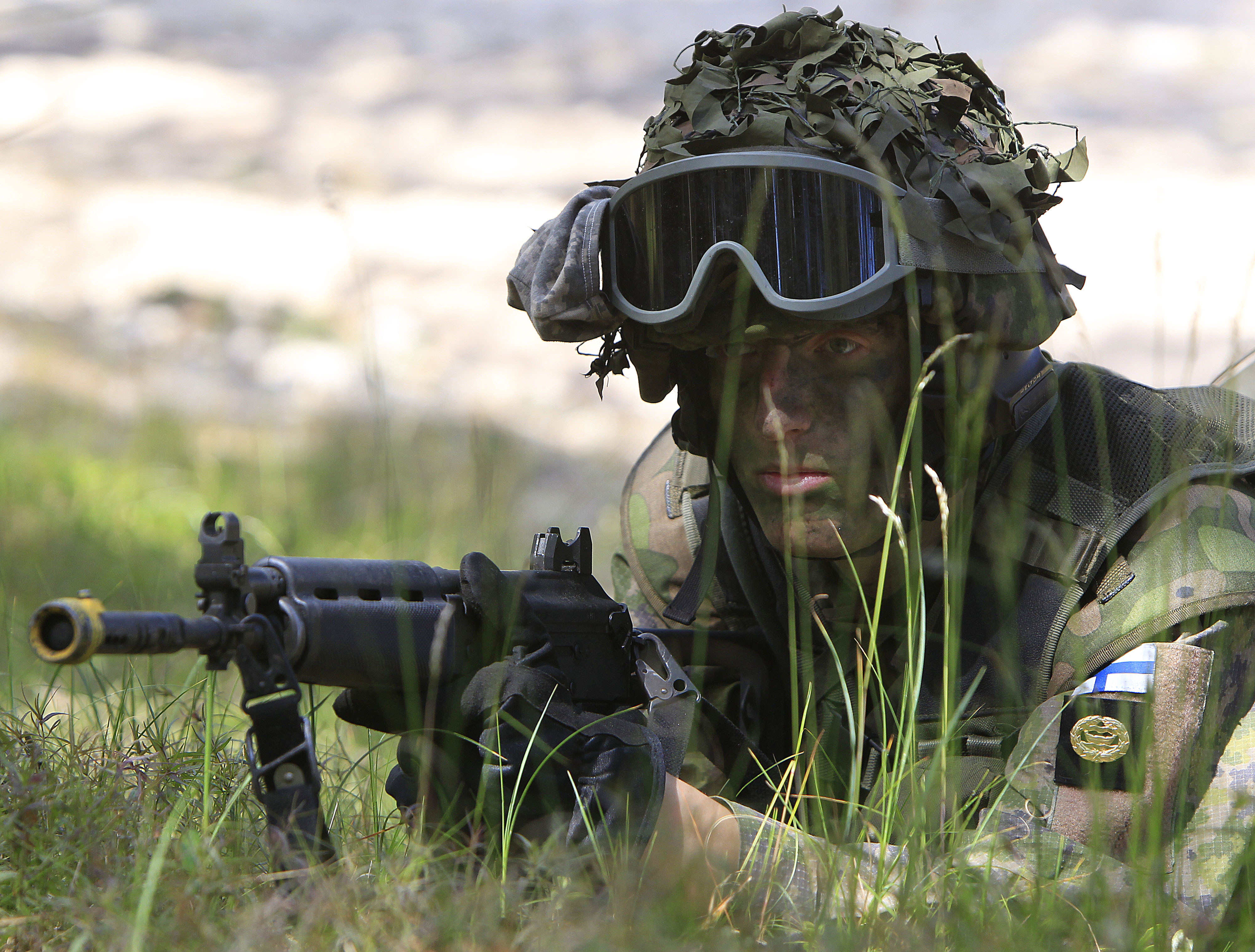 A Finnish soldier participates in the amphibious operations as part of NATO sea exercises BALTOPS 2015 in Ustka, Poland, on June 17, 2015. NATO Secretary-General Jens Stoltenberg said Monday Finland will become the 31st member of the world's biggest military alliance on Tuesday, prompting a warning from Russia that it would bolster its defenses near their joint border if NATO deploys any troops in its new member. Source: Czarek Sokolowski,AP.