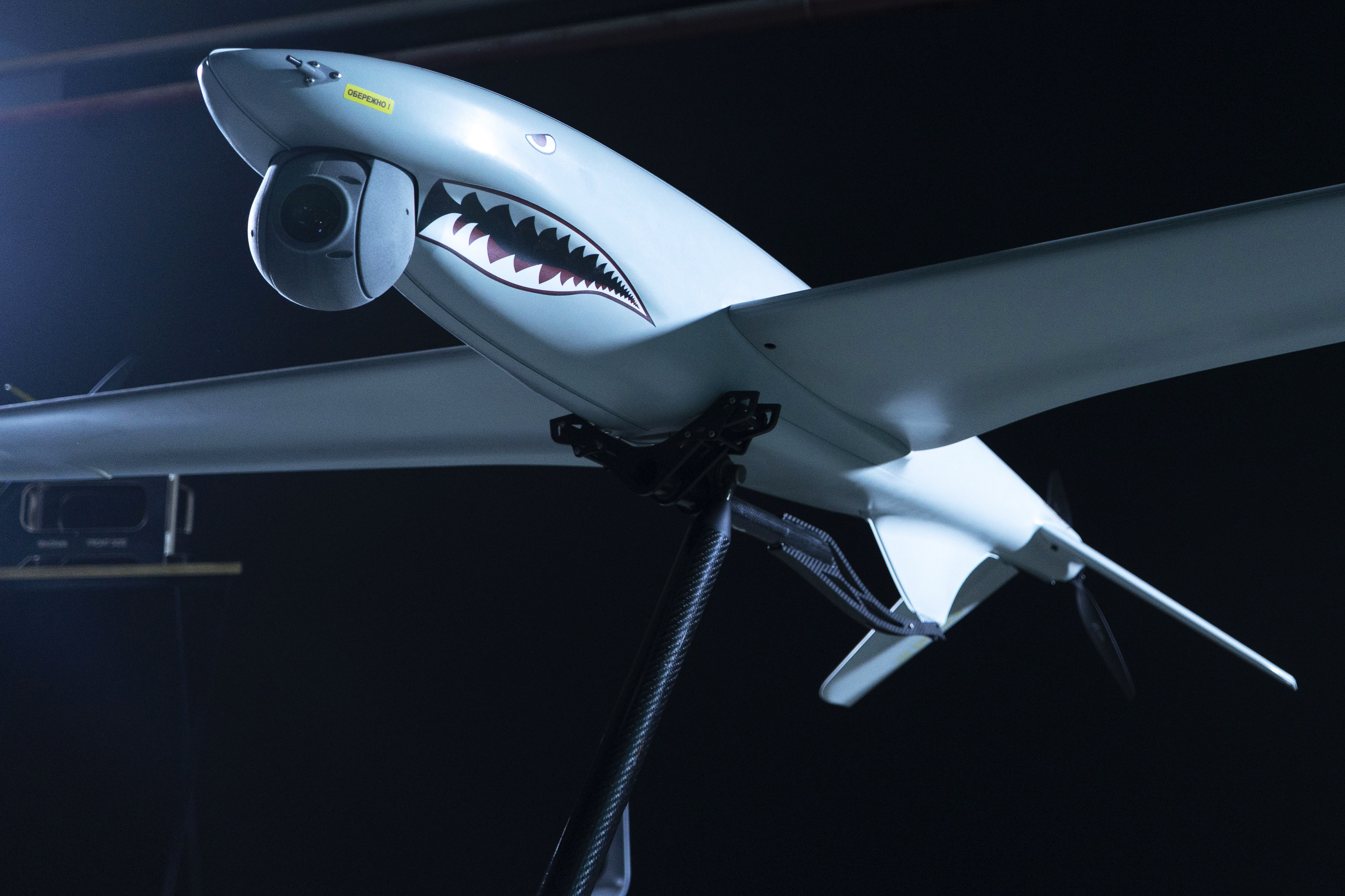 Unmanned aerial system 'Shark' featured at the exhibition that shows some of the Ukrainian technologies being used on the battlefield as a part of a presentation of the new so-called BRAVE1 initiative, held in an underground parking lot in Kyiv, Ukraine, Wednesday, April 26, 2023. The Ukrainian government on Wednesday launched the initiative meant to streamline and promote innovation in the development of drones and other technologies that have been critical in the war with Russia. Source: AP Photo