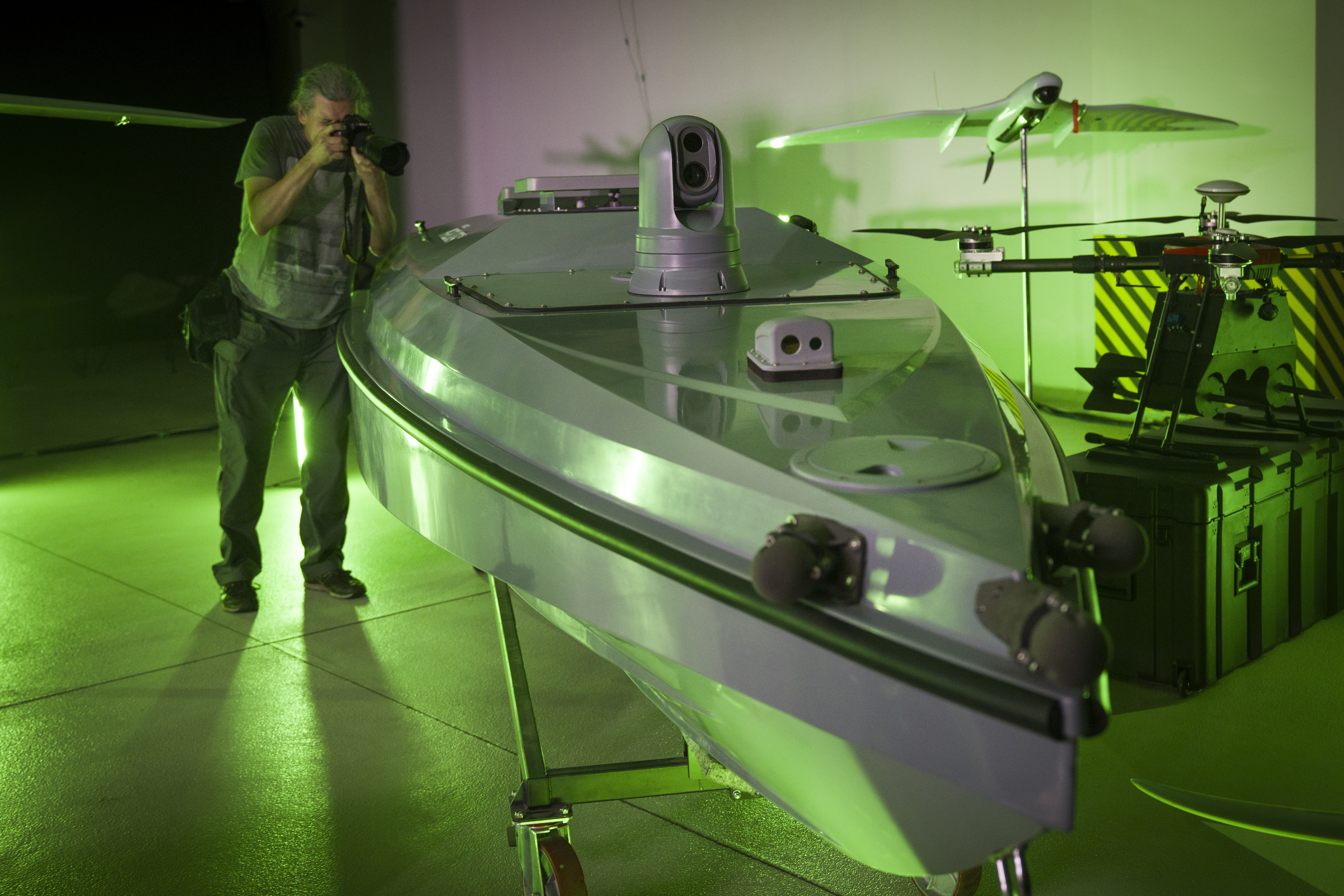 A photographer takes a photo of a sea drone, Magura V5, during the presentation of Ukraine's army newly created Unmanned Systems Forces in Kyiv, Ukraine, Tuesday, June 11, 2024. Source: AP Photo.